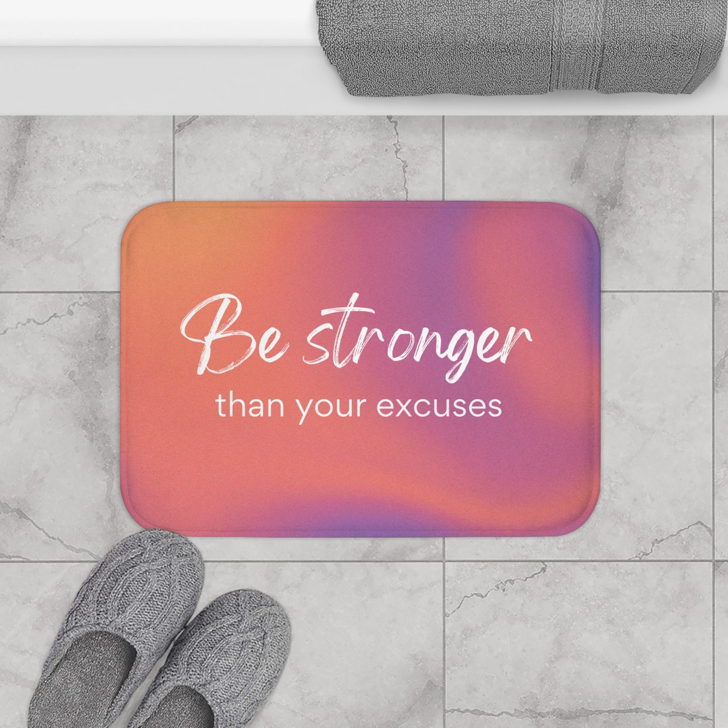 Be Unyielding Against Your Excuses Bath Mat
