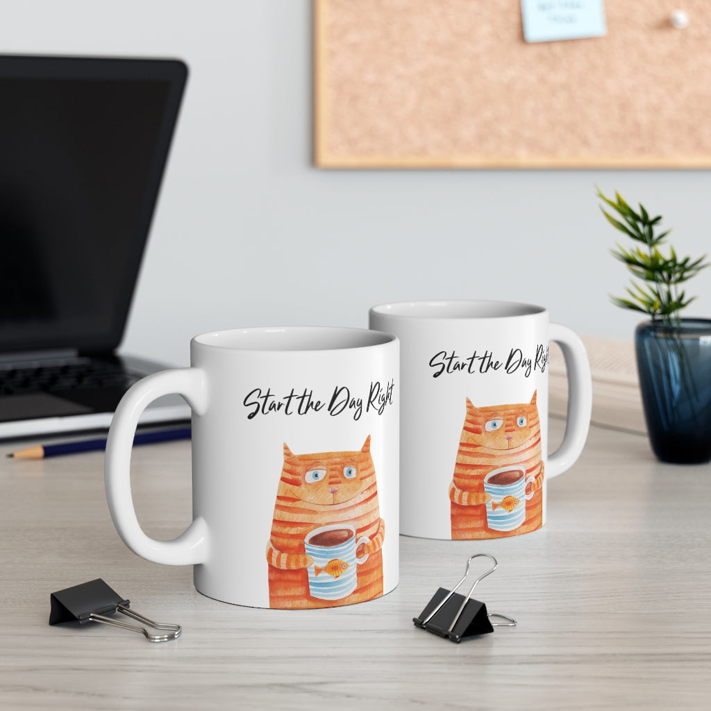 Start Your Day Off Right with the Cat Holding Goldfish Coffee Tea Mug