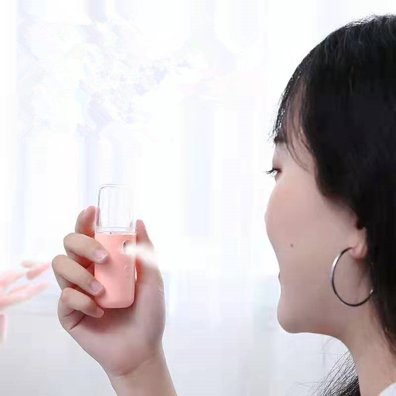 Compact Handheld 30ml Nano Hydrating Mist: A Revised Title