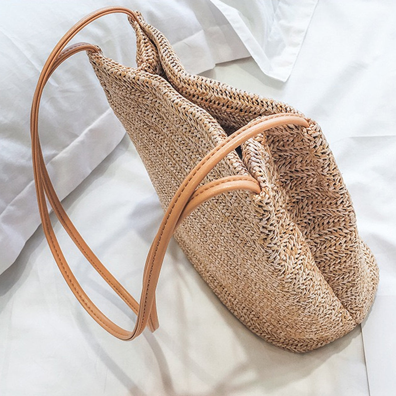 Sleek Faux Leather Handle Woven Straw Bag