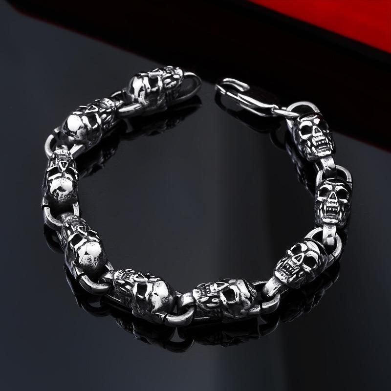 Reworking the title to emphasize the product's essence while maintaining its distinctiveness from the original. Any references to '""' or similar labels should be eliminated. 

Skull-Adorned Gothic Chain Bracelet