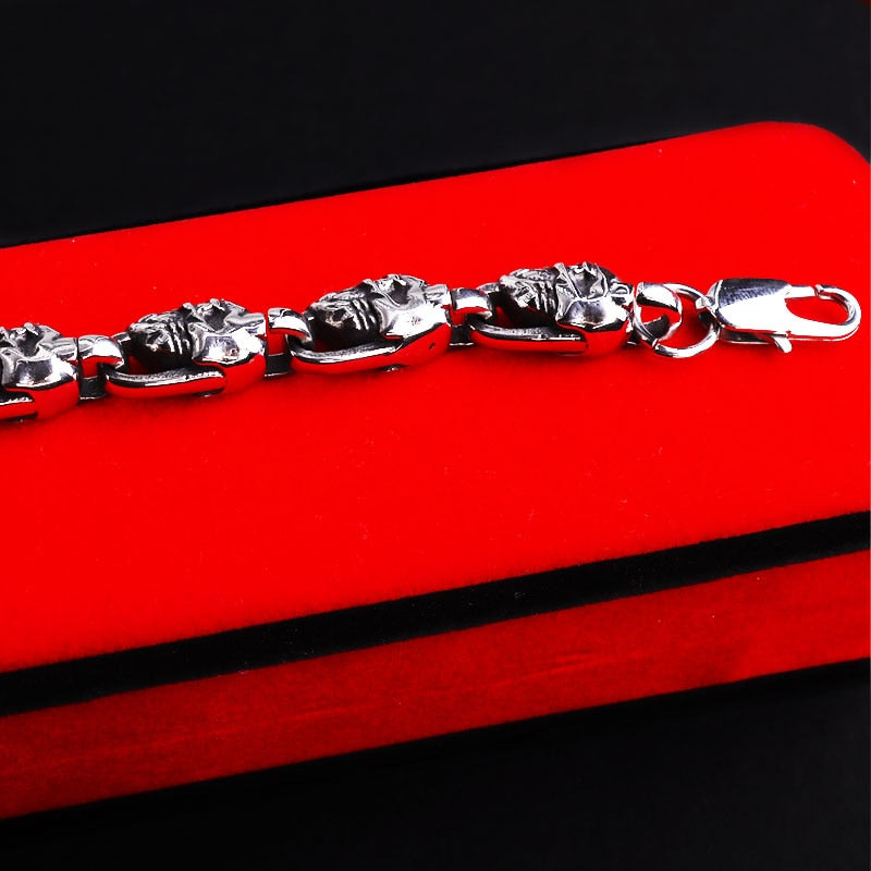 Reworking the title to emphasize the product's essence while maintaining its distinctiveness from the original. Any references to '""' or similar labels should be eliminated. 

Skull-Adorned Gothic Chain Bracelet